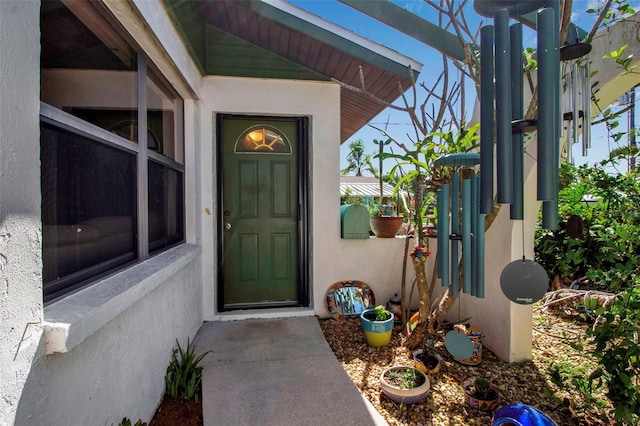 9011 Hilolo Ln, Venice, FL 34293 - view of exterior entry with stucco siding