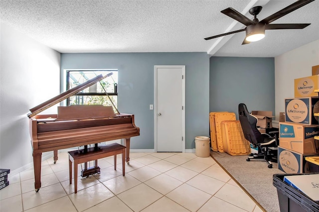 9011 Hilolo Ln, Venice, FL 34293 - tiled office space featuring a textured ceiling, ceiling fan, and baseboards