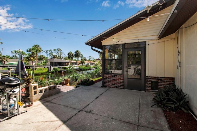 9011 Hilolo Ln, Venice, FL 34293 - view of patio / terrace with fence and a sunroom