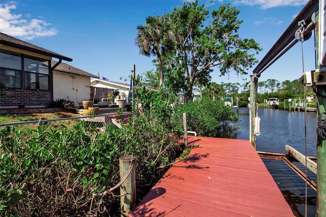 9011 Hilolo Ln, Venice, FL 34293 - view of dock featuring a water view