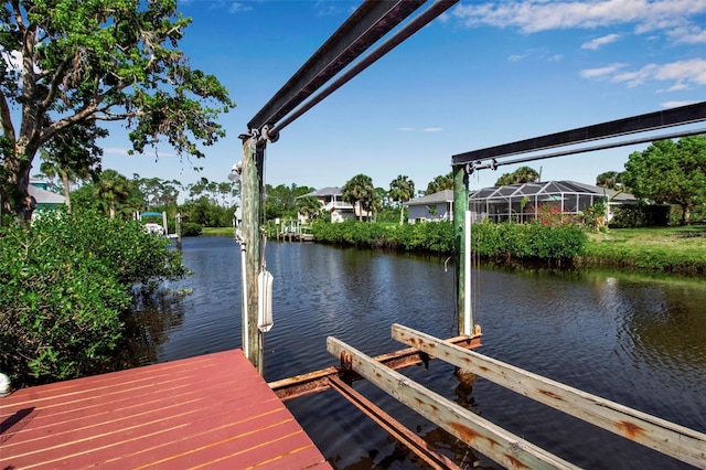 9011 Hilolo Ln, Venice, FL 34293 - view of dock featuring a water view