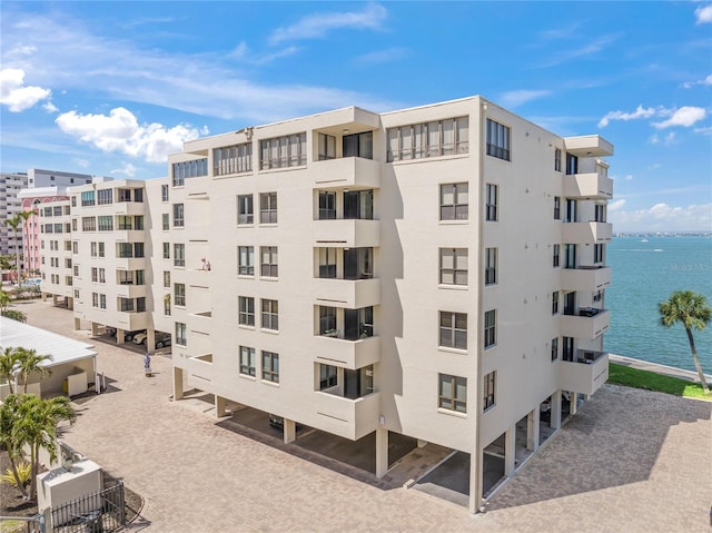 view of building exterior featuring a water view
