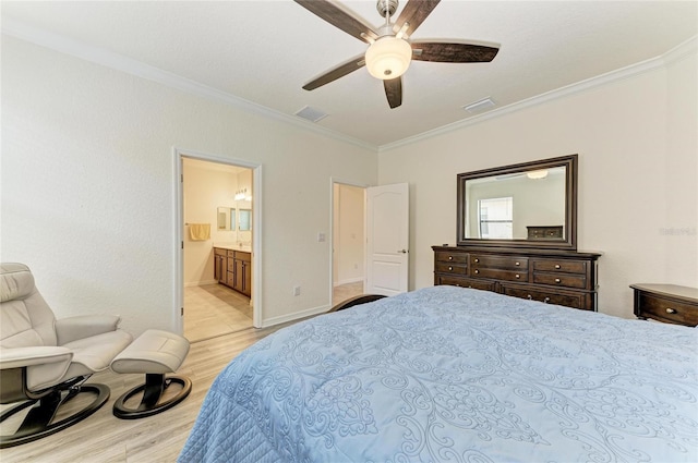 bedroom featuring baseboards, crown molding, visible vents, and light wood-type flooring