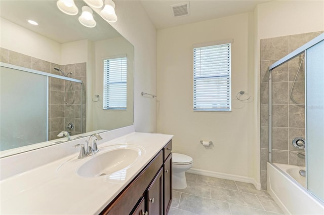 bathroom featuring toilet, vanity, a chandelier, baseboards, and visible vents