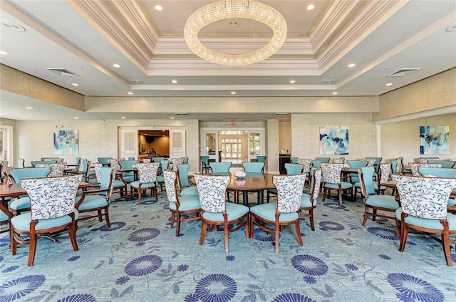 carpeted dining area featuring recessed lighting, ornamental molding, visible vents, and a raised ceiling