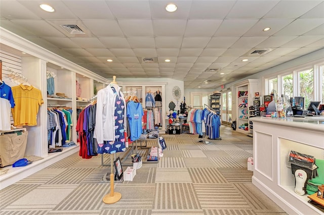 exercise room featuring carpet, visible vents, and recessed lighting