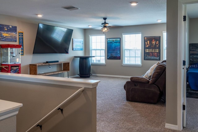 11702 Tetrafin Dr, Riverview, FL 33579 - living room with carpet floors, a ceiling fan, and baseboards