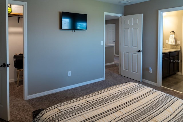 11702 Tetrafin Dr, Riverview, FL 33579 - bedroom featuring carpet flooring, baseboards, a closet, and connected bathroom