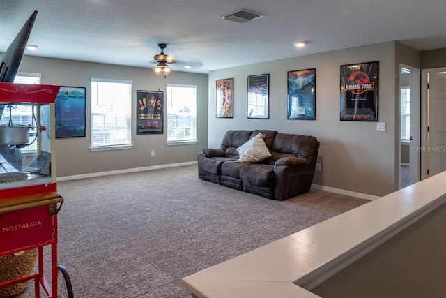 11702 Tetrafin Dr, Riverview, FL 33579 - living room with carpet floors, ceiling fan, and baseboards