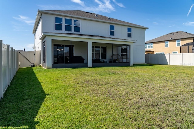 11702 Tetrafin Dr, Riverview, FL 33579 - back of property with a sunroom, stucco siding, and roof with shingles