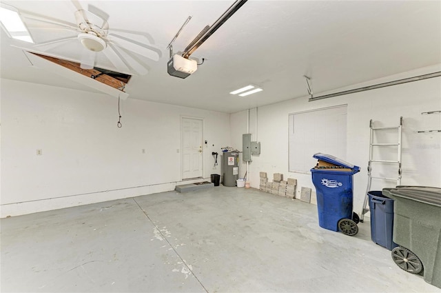 garage featuring a garage door opener and electric panel