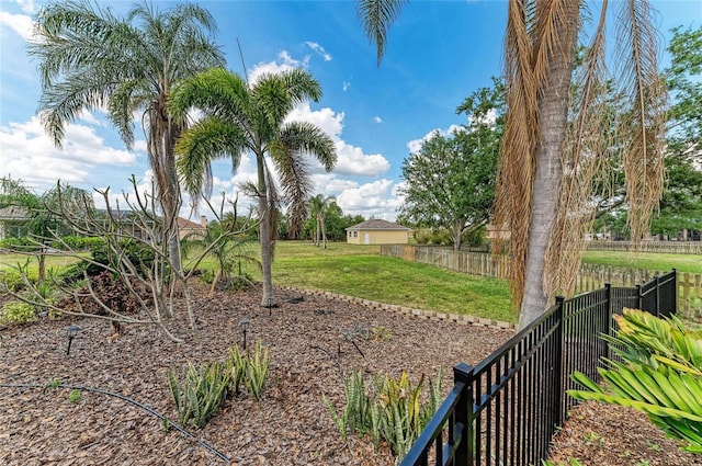 view of yard with fence