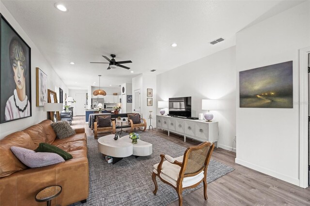 1800 Little Bird Ct, Sarasota, FL 34235 - living room with ceiling fan, light wood-type flooring, and recessed lighting