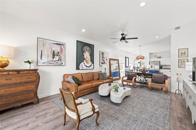 1800 Little Bird Ct, Sarasota, FL 34235 - living area featuring light wood finished floors, a ceiling fan, and recessed lighting