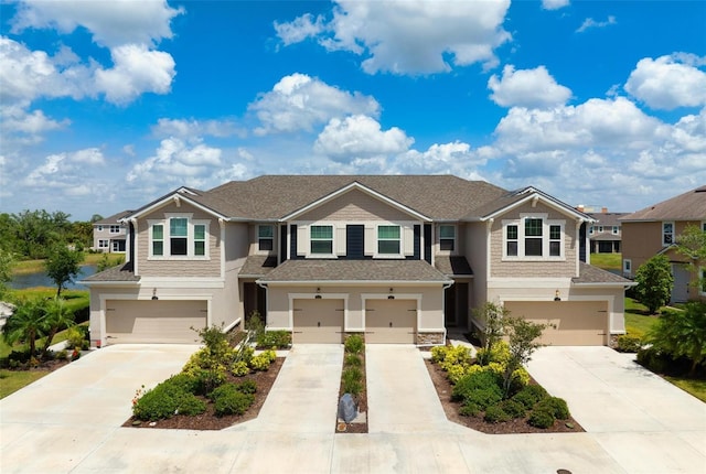 5543 Pleasantview Ct, Bradenton, FL 34211 - view of front facade featuring a garage, stucco siding, and driveway
