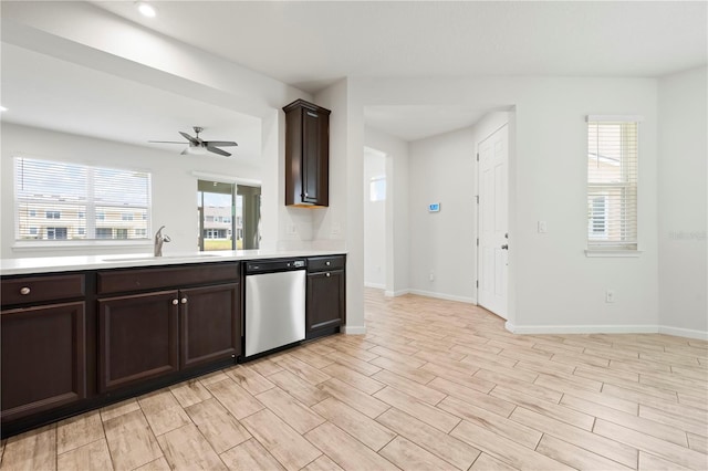 5543 Pleasantview Ct, Bradenton, FL 34211 - kitchen featuring a sink, light countertops, stainless steel dishwasher, and dark brown cabinetry