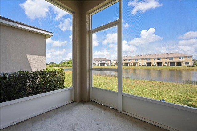 5543 Pleasantview Ct, Bradenton, FL 34211 - unfurnished sunroom with a water view and a residential view