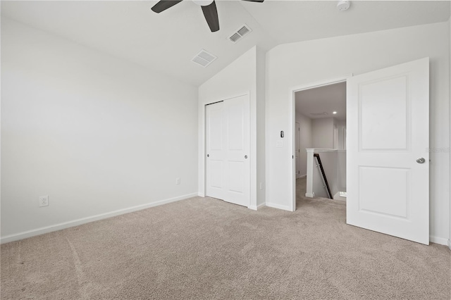 5543 Pleasantview Ct, Bradenton, FL 34211 - unfurnished bedroom with carpet floors, baseboards, lofted ceiling, and visible vents