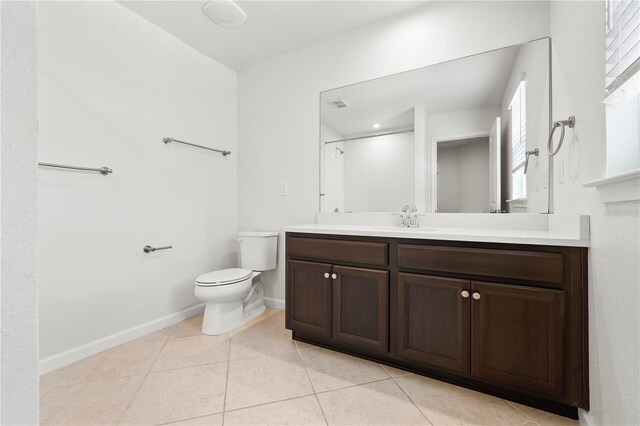 5543 Pleasantview Ct, Bradenton, FL 34211 - full bath with visible vents, tile patterned flooring, baseboards, vanity, and toilet