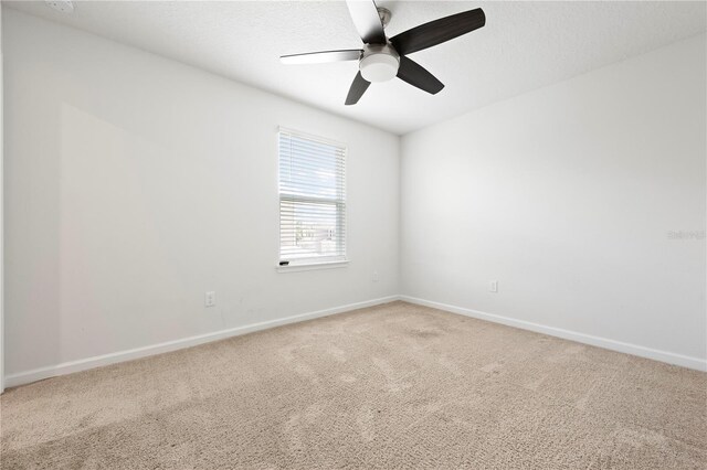 5543 Pleasantview Ct, Bradenton, FL 34211 - empty room with carpet floors, a ceiling fan, and baseboards