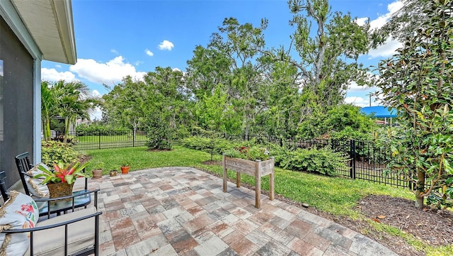 8110 Trimbelle Ter, Parrish, FL 34219 - fenced backyard featuring a patio