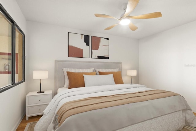 825 S Osprey Ave Unit 302, Sarasota, FL 34236 - bedroom featuring ceiling fan and wood finished floors