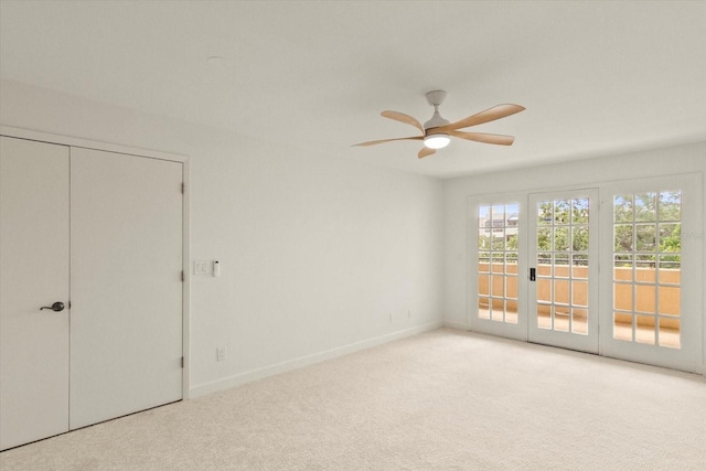 825 S Osprey Ave Unit 302, Sarasota, FL 34236 - interior space with carpet floors, baseboards, access to outside, and ceiling fan