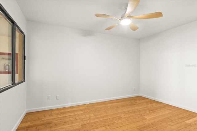 825 S Osprey Ave Unit 302, Sarasota, FL 34236 - empty room featuring baseboards, light wood-style floors, and ceiling fan