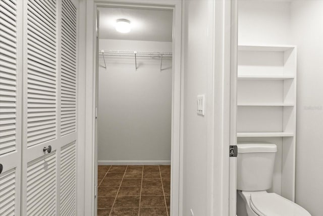 825 S Osprey Ave Unit 302, Sarasota, FL 34236 - bathroom with toilet and a spacious closet