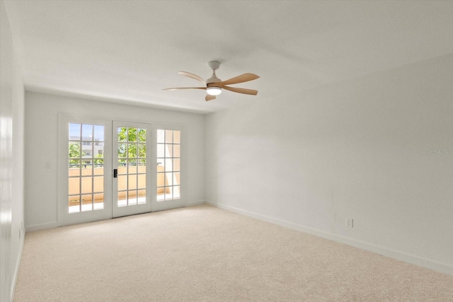 825 S Osprey Ave Unit 302, Sarasota, FL 34236 - carpeted empty room with baseboards and a ceiling fan