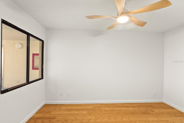 825 S Osprey Ave Unit 302, Sarasota, FL 34236 - empty room featuring baseboards, ceiling fan, and wood finished floors