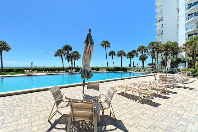 community pool featuring a patio