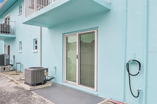 117 7th St N Unit 5, Bradenton Beach, FL 34217 - view of patio featuring cooling unit