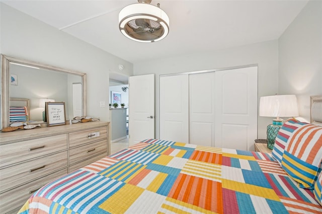 117 7th St N Unit 5, Bradenton Beach, FL 34217 - bedroom with a closet and ceiling fan