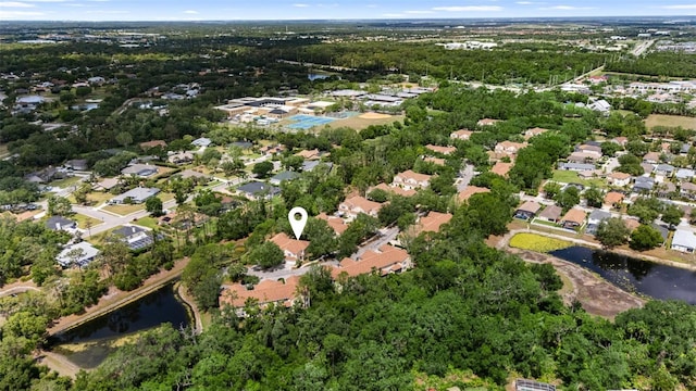 aerial view featuring a residential view and a water view