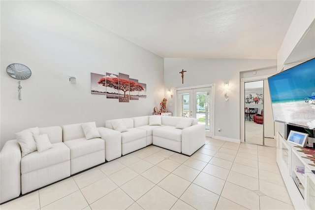 3053 Monica Pkwy, Sarasota, FL 34234 - living room with lofted ceiling, light tile patterned flooring, french doors, and baseboards