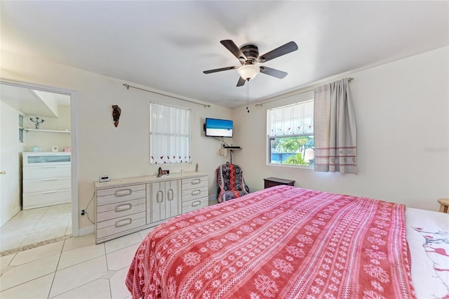 3053 Monica Pkwy, Sarasota, FL 34234 - bedroom featuring a ceiling fan, baseboards, and light tile patterned floors