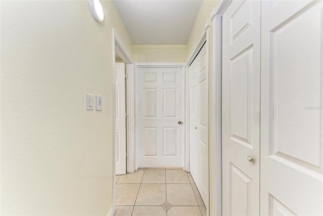 3053 Monica Pkwy, Sarasota, FL 34234 - hall with baseboards and light tile patterned floors