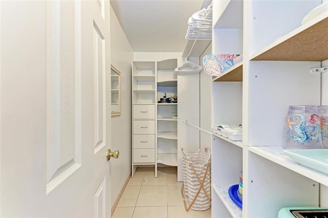 3053 Monica Pkwy, Sarasota, FL 34234 - spacious closet with light tile patterned flooring