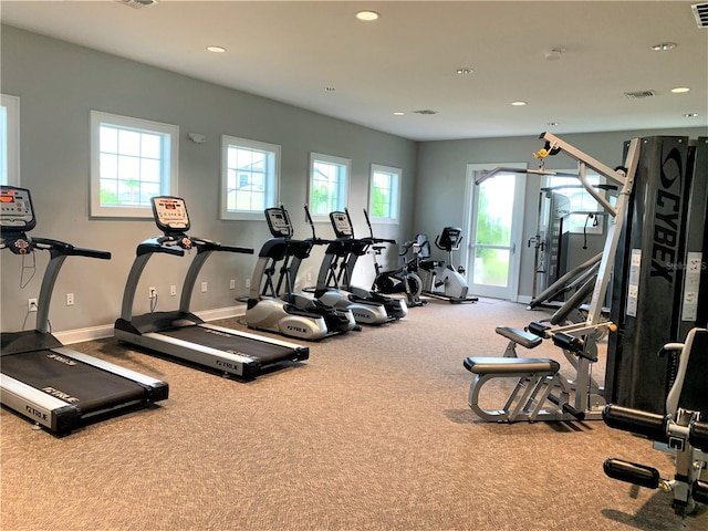 gym featuring plenty of natural light, recessed lighting, and visible vents