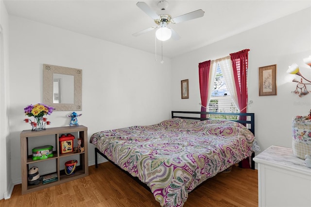 3459 Lotus Rd, North Port, FL 34291 - bedroom with ceiling fan and wood finished floors