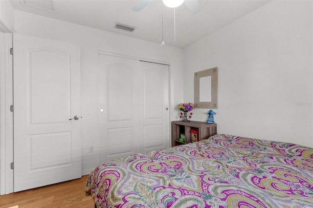 3459 Lotus Rd, North Port, FL 34291 - bedroom with visible vents, a closet, light wood-style flooring, and ceiling fan