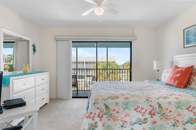 bedroom with access to exterior, light colored carpet, and ceiling fan