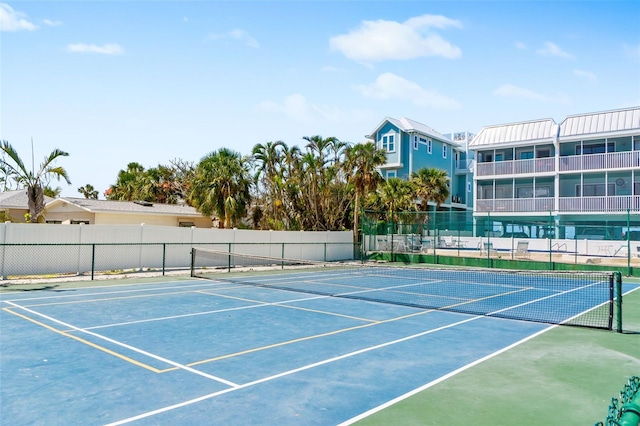 view of sport court featuring community basketball court and fence