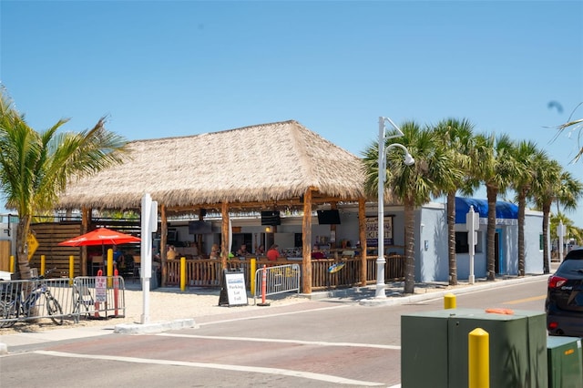 view of building exterior with fence