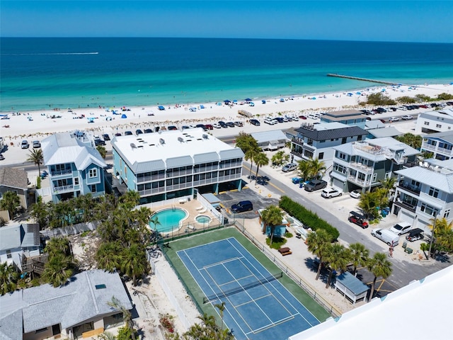 bird's eye view featuring a beach view and a water view
