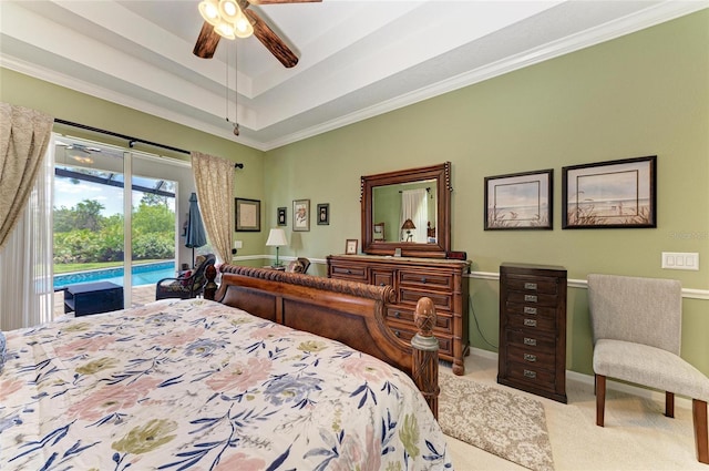 8136 Snowy Egret Pl, Bradenton, FL 34202 - carpeted bedroom with access to exterior, ornamental molding, a raised ceiling, and ceiling fan