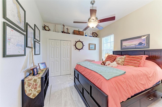8136 Snowy Egret Pl, Bradenton, FL 34202 - bedroom with light colored carpet, a closet, and a ceiling fan