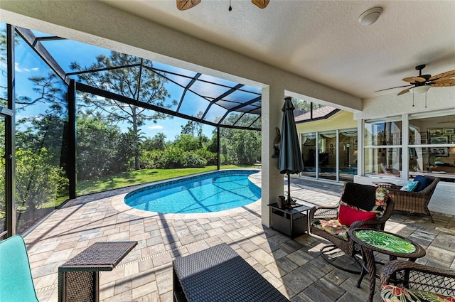 8136 Snowy Egret Pl, Bradenton, FL 34202 - outdoor pool featuring a ceiling fan, a patio area, and a lanai