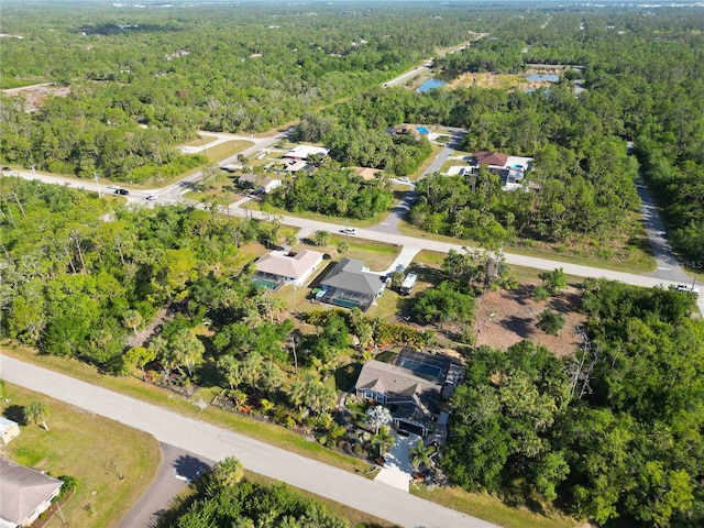18033 Edgewater Dr, Port Charlotte, FL 33948 - bird's eye view featuring a view of trees